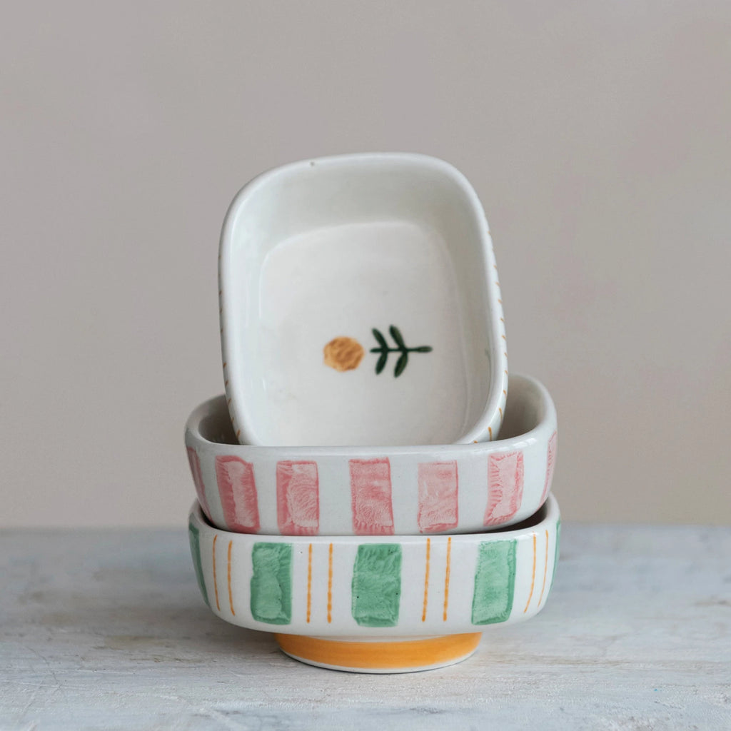 Hand-painted stoneware footed dish with floral design inside and stripe patterns outside, available in Pink Stripe Bloom, Green Meadow Stripe, and Golden Harvest Stripe styles.