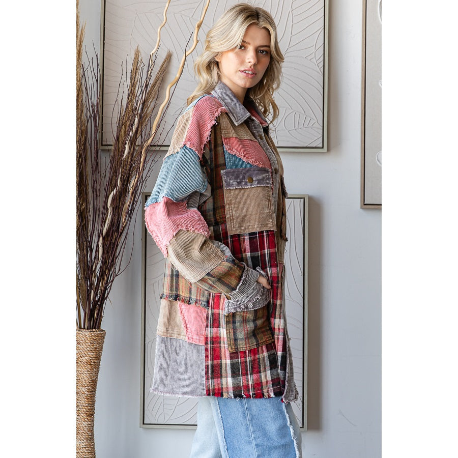 Woman wearing a patchwork jacket in a room with decorative elements