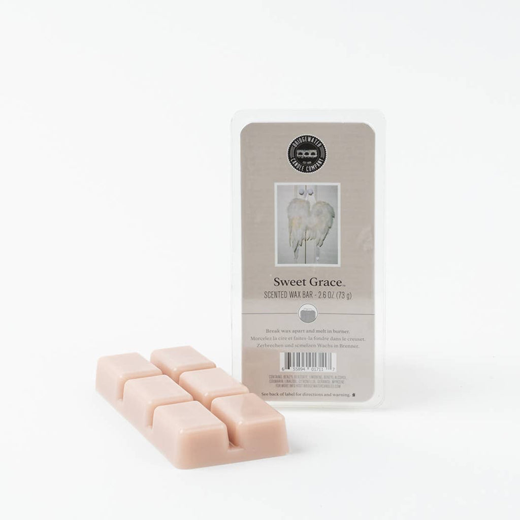 Scented wax bars with packaging labeled 'Sweet Grace' on a white background