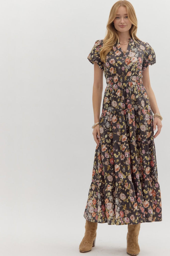 Woman wearing a floral dress on a white background