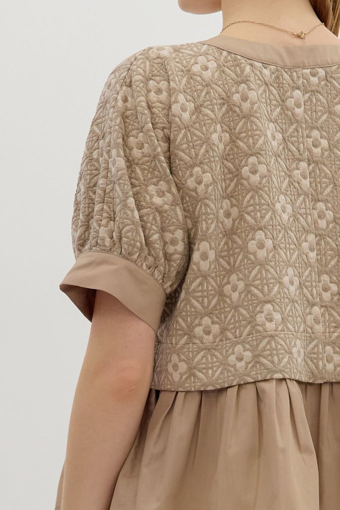 Mocha floral jacquard short sleeve pullover top with contrast ruffle hem and lightweight knit fabric, boutique women's blouse for summer fashion back view
