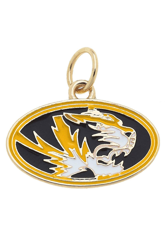 Gold pendant with a tiger emblem on a black background