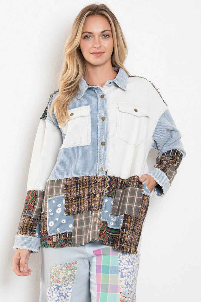 Color-block jacket featuring blue corduroy, light denim, tan plaid, and brown flannel patches with button front and oversized fit.