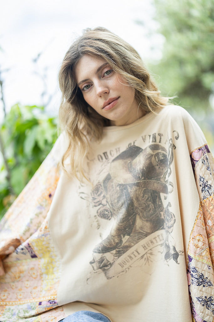Rowena Upcycled Patchwork Graphic Top featuring mixed floral sleeves, western boot graphic, oversized mineral-washed cotton design.
