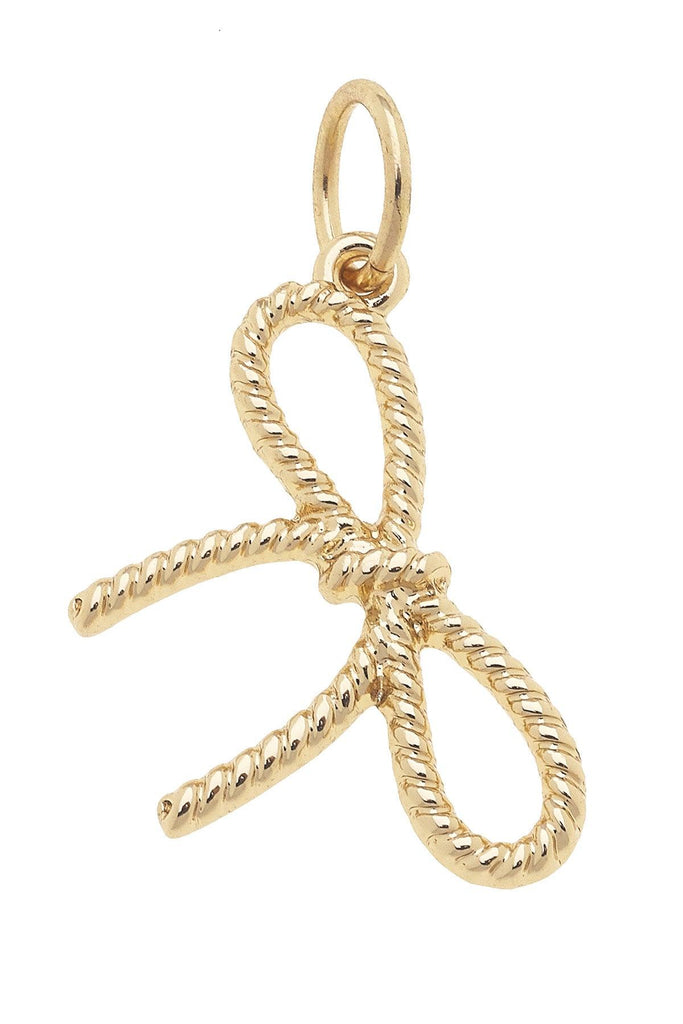 Gold bow-shaped pendant on a white background
