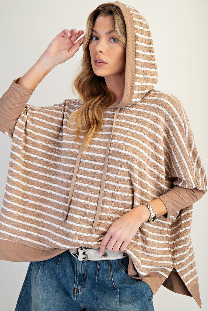 Latte-toned textured pullover hoodie with dolman sleeves, subtle stripe pattern, and a relaxed luxe fit. women's boutique easel