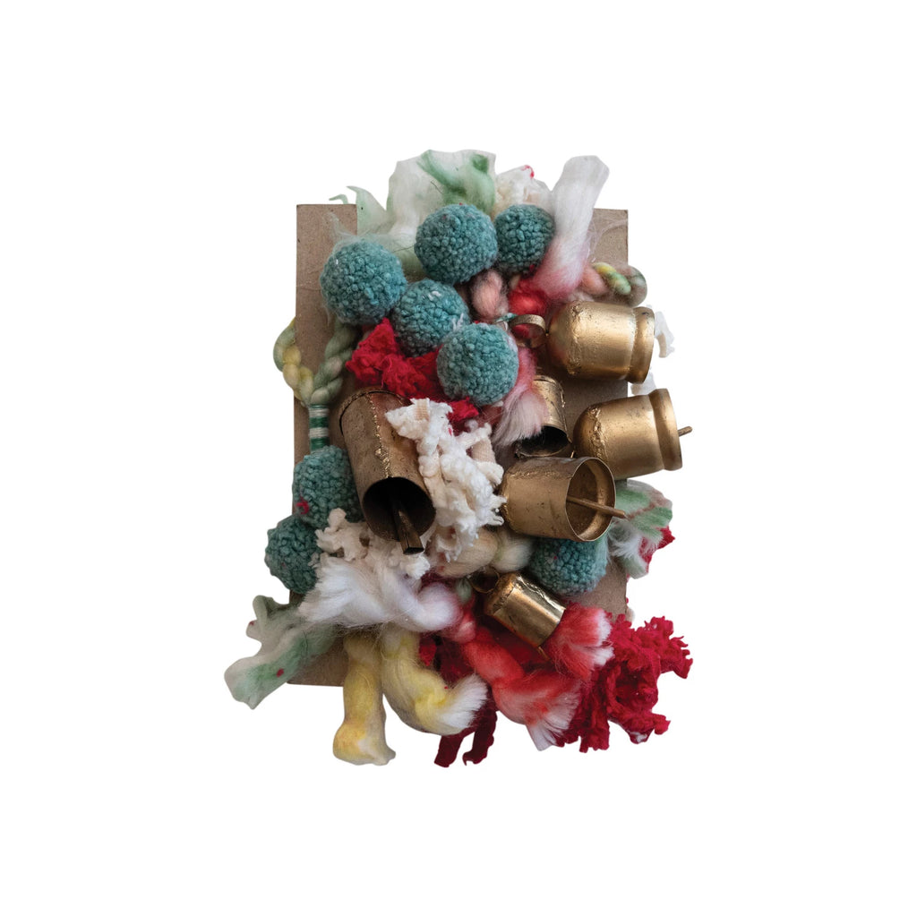 Handmade wool and cotton garland with colorful pom poms, tassels, and antique gold metal bells, 72 inches long, hanging holiday decoration.